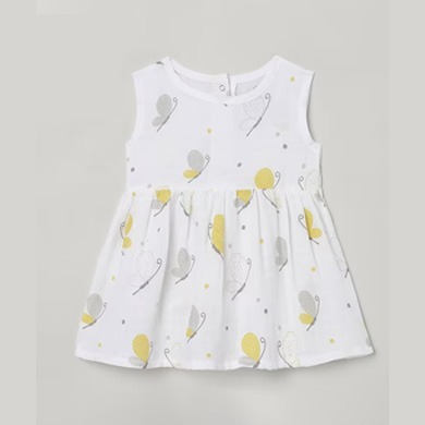 Lightweight muslin dress for kids in pastel colors, featuring a playful floral pattern and short sleeves, perfect for summer outings.